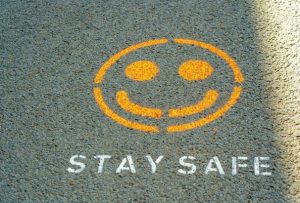 A stay safe sign that signifies how the pandemic has affected the market and home downsizing